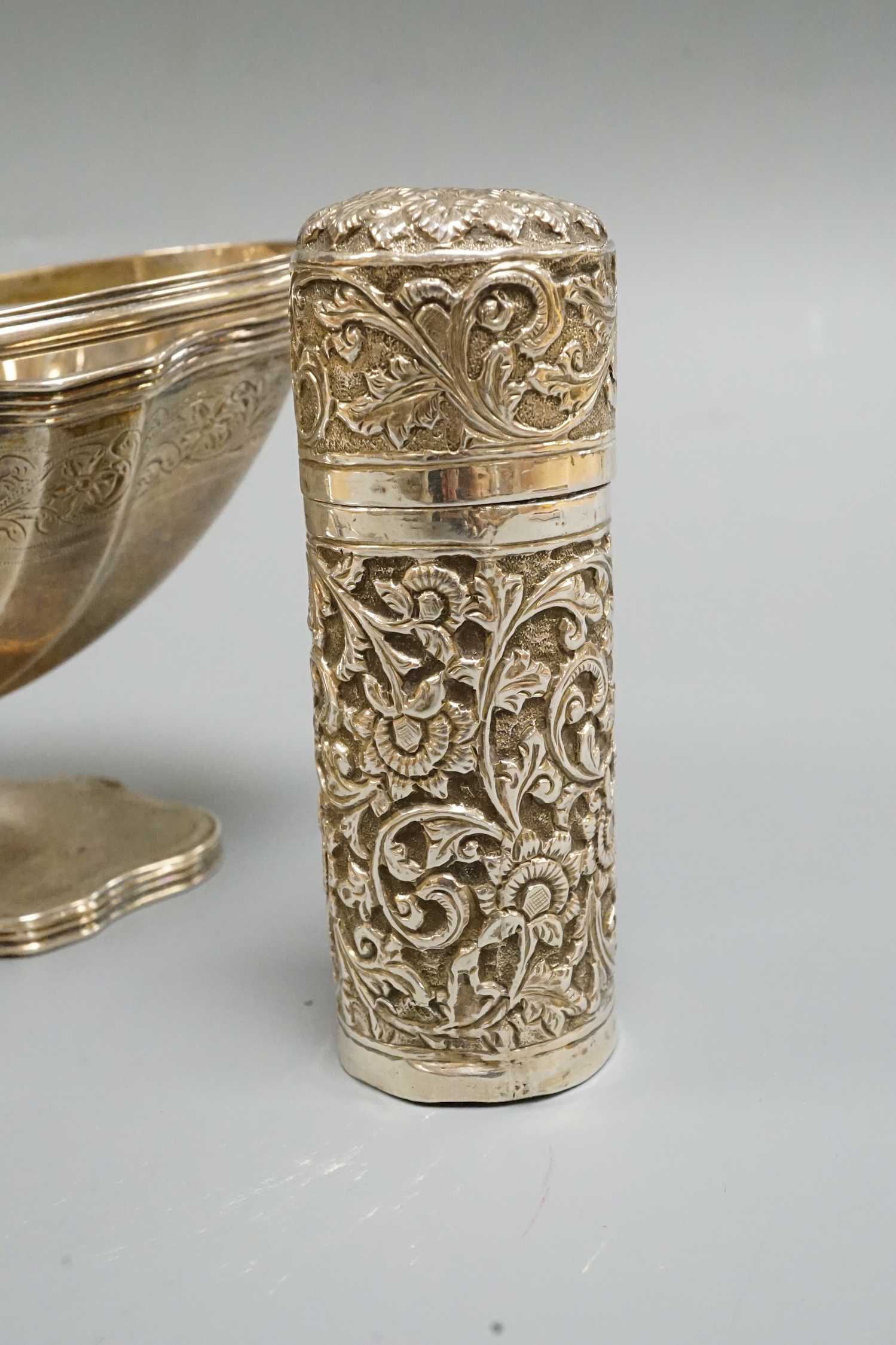 A pair of George III silver Old English pattern tablespoons, London, 1810, a later silver sugar basket and Indian white metal canister.